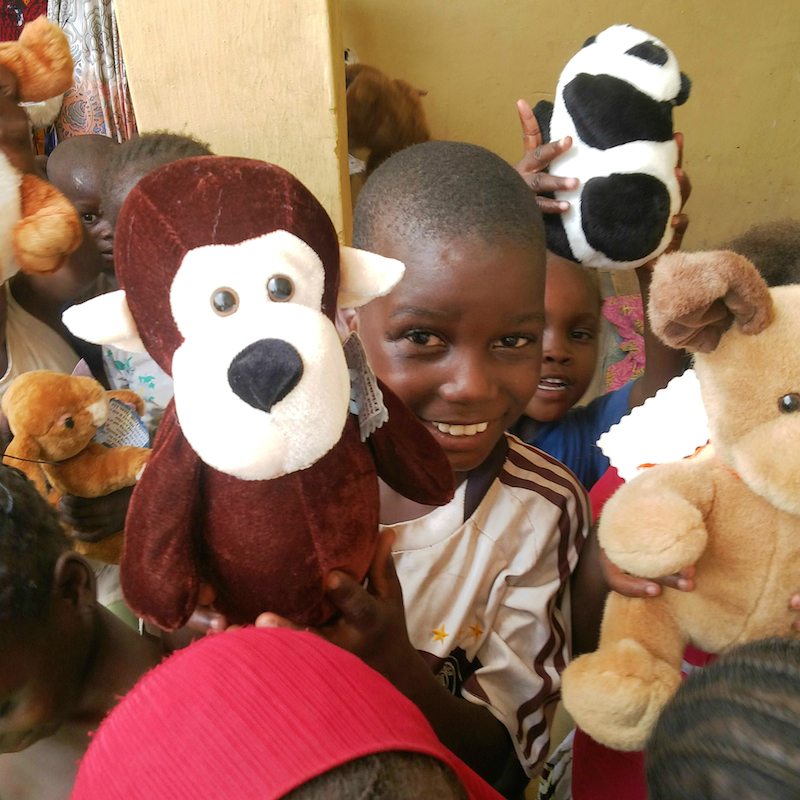 Children rescued from Boko Haram with their new toys site